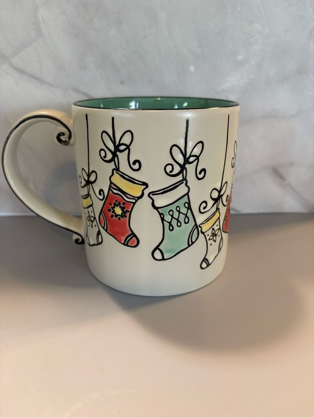 Cream Ceramic Holiday Stocking Mug with Mint Interior